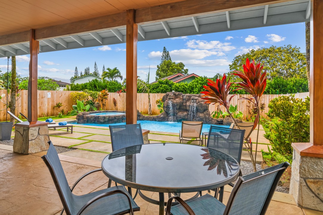 Covered lanai with round outdoor table
